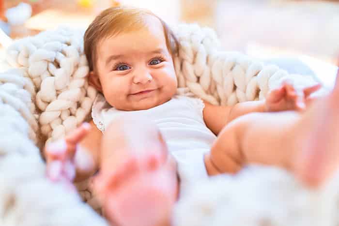 Beautiful baby happy at a Montessori Pre-school and Nursery Serving Colindale, Edgware & St Albans UK