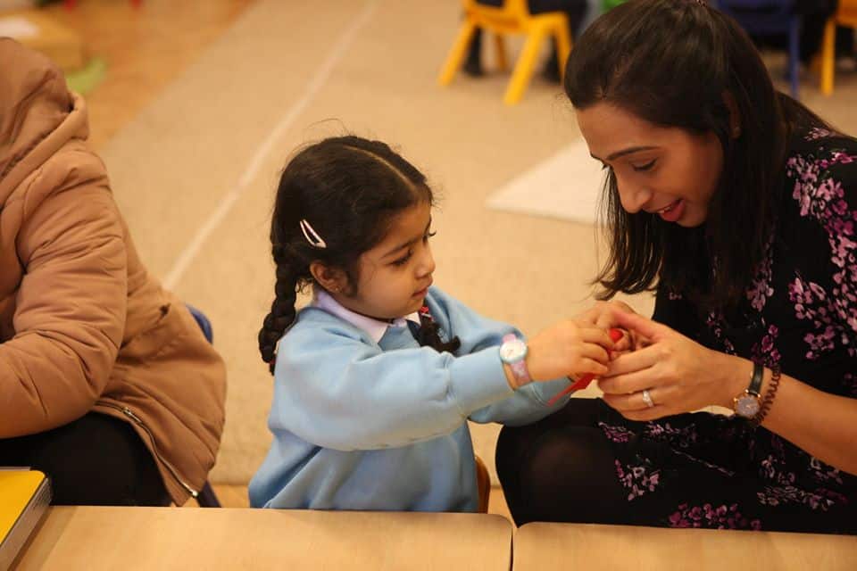 happy mom and daughter at a Montessori Pre-school and Nursery Serving Colindale, Edgware & St Albans UK